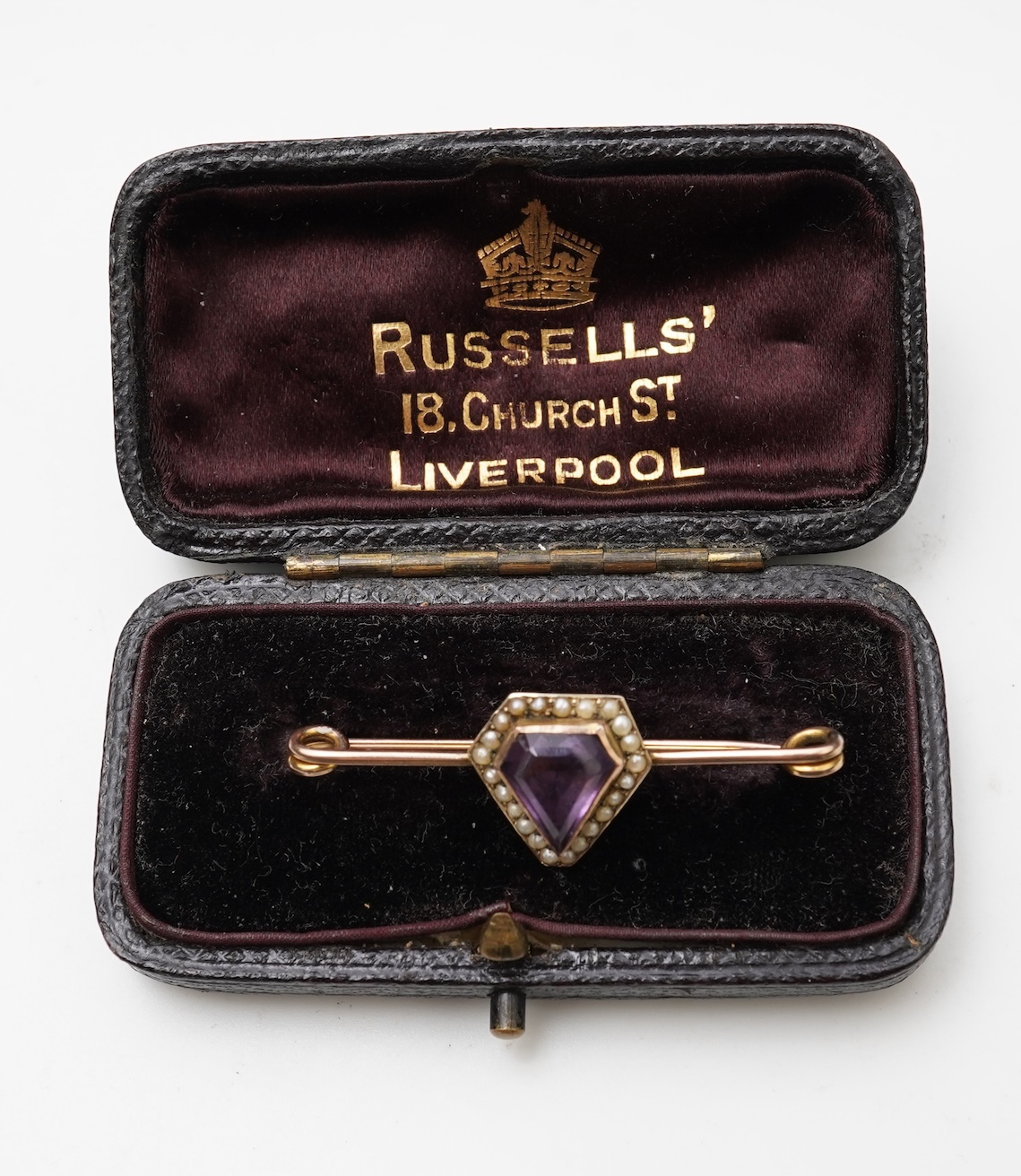 An Edwardian amethyst and seed pearl pendant and bar brooch, early 20th century
